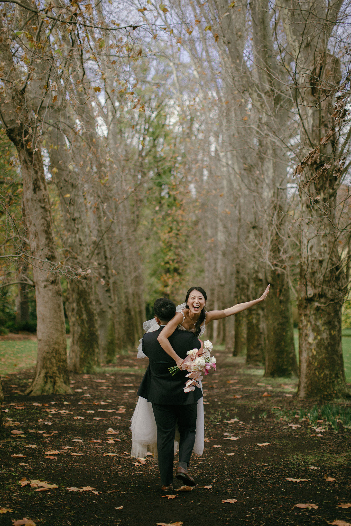 Melbourne Pre-Wedding Photoshoot | Parliament House, Fitzroy Gardens, Melbourne Streets & Half Moon Bay at Fitzroy Gardens pre-wedding photo