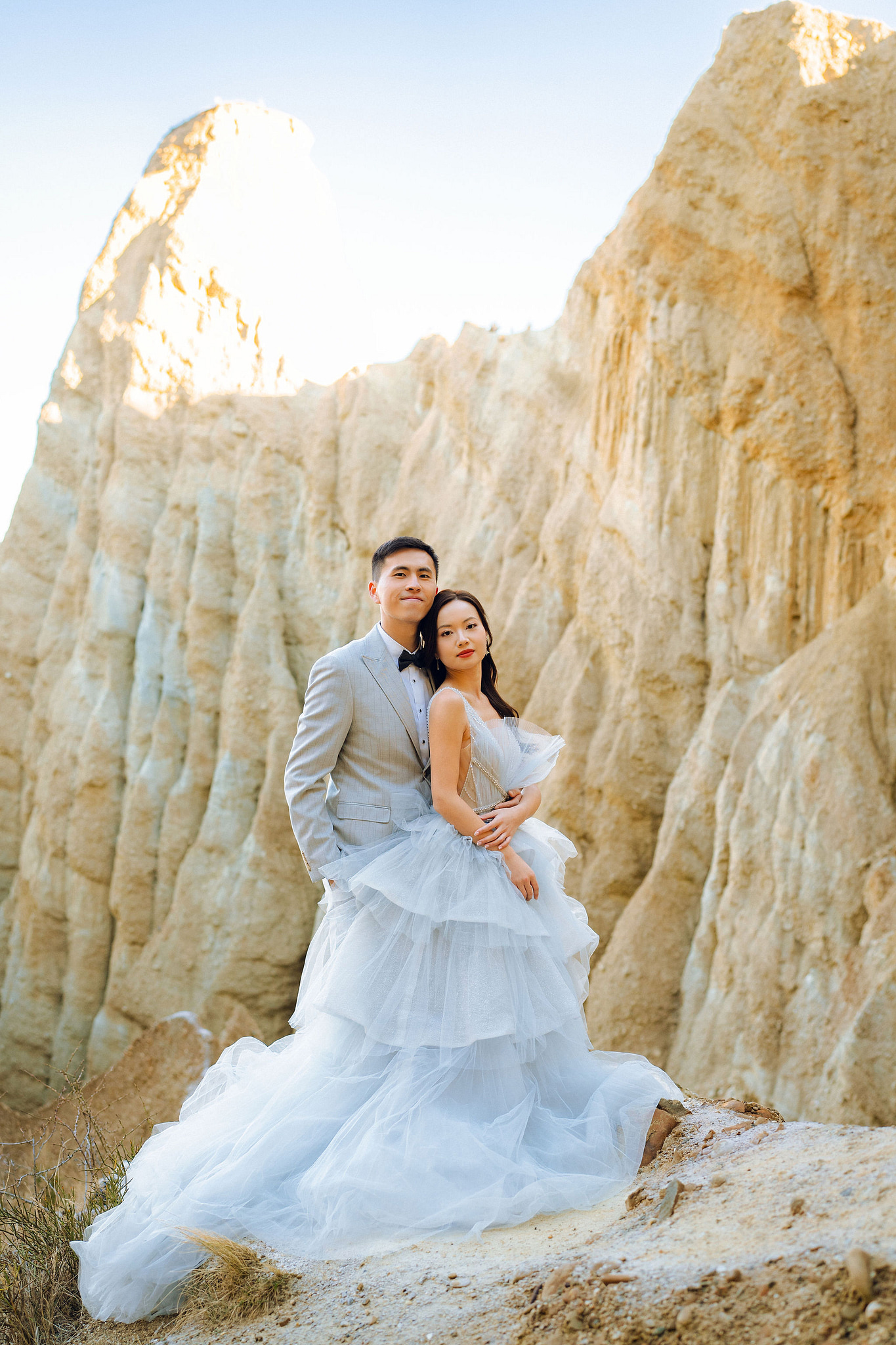 New Zealand Pre-Wedding Photoshoot with Lake Wakatipu, Skippers Canyon, Lake Tekapo, Mount Cook, and Omarama Clay Cliffs at Omarama Clay Cliffs pre-wedding photo