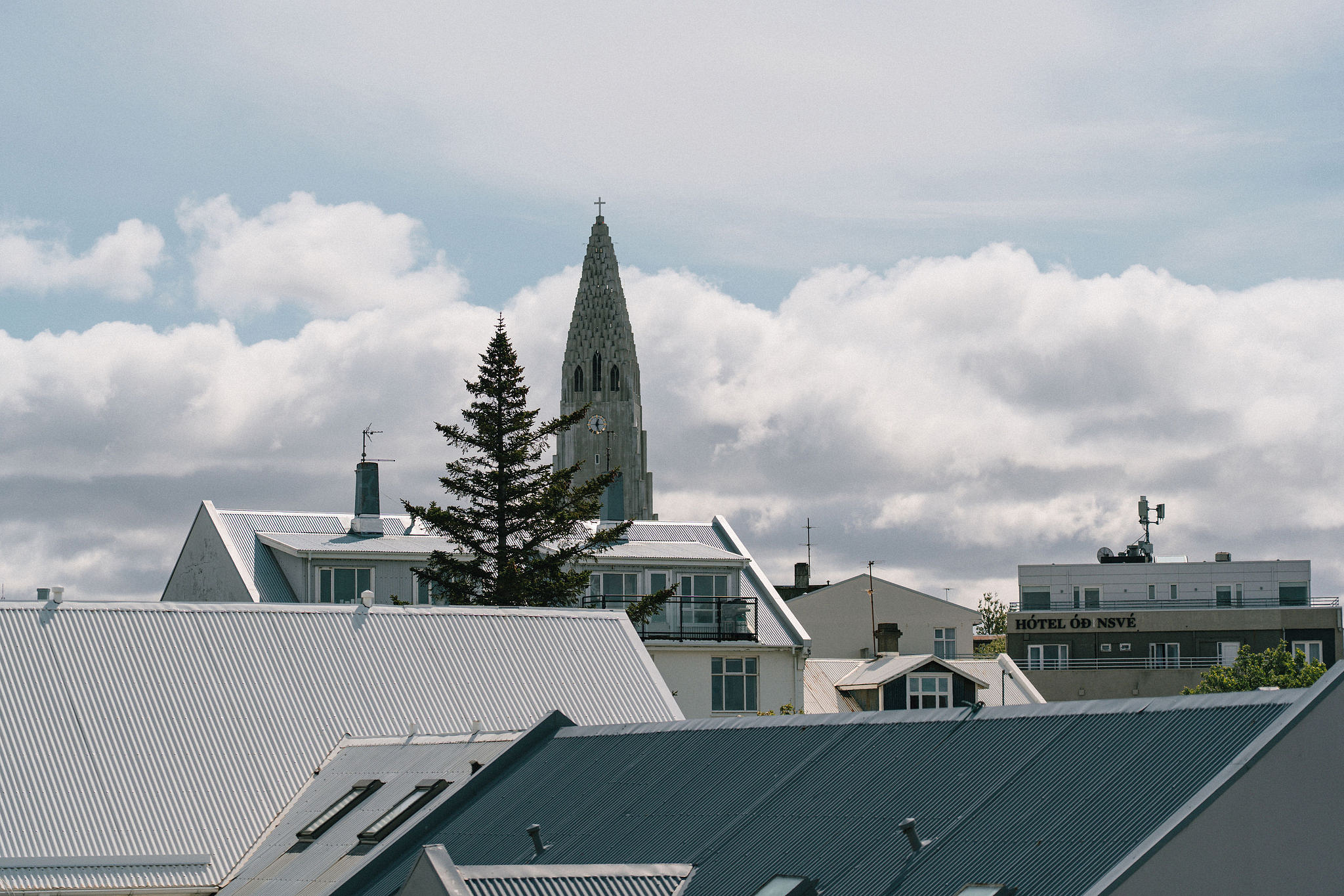 Iceland Pre-Wedding Photoshoot | Hallgrimskirkja, Skogafoss, DC Plane Wreck & Black Sand Beach at Hallgrimskirkja Church pre-wedding photo