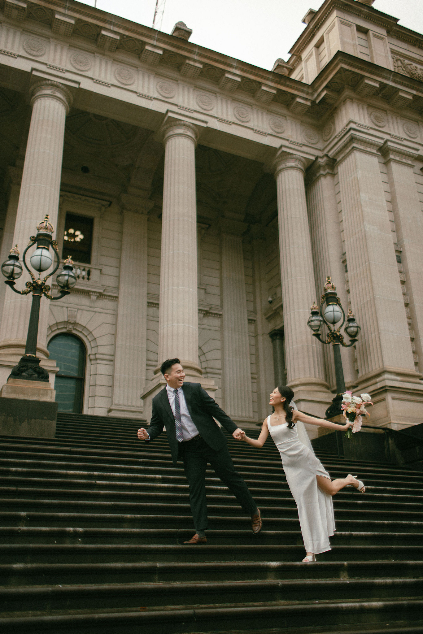 Melbourne Pre-Wedding Photoshoot | Parliament House, Fitzroy Gardens, Melbourne Streets & Half Moon Bay at Parliament House pre-wedding photo