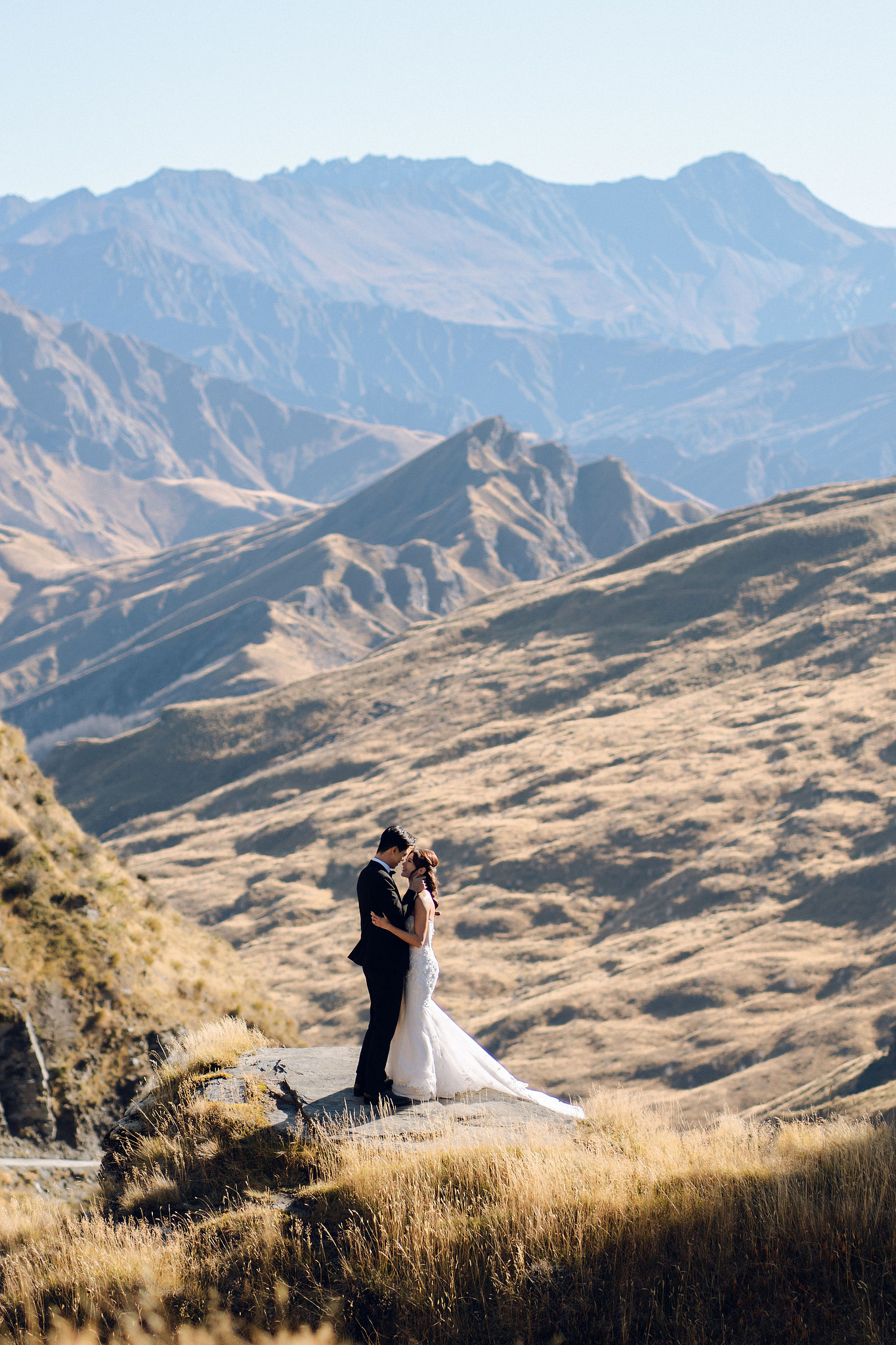 New Zealand Autumn Pre-Wedding Photoshoot Twin Peak Skippers Canyon Alpaca Farm Hilltop Cardrona Night Shoot Kombi Van at Skippers Canyon pre-wedding photo