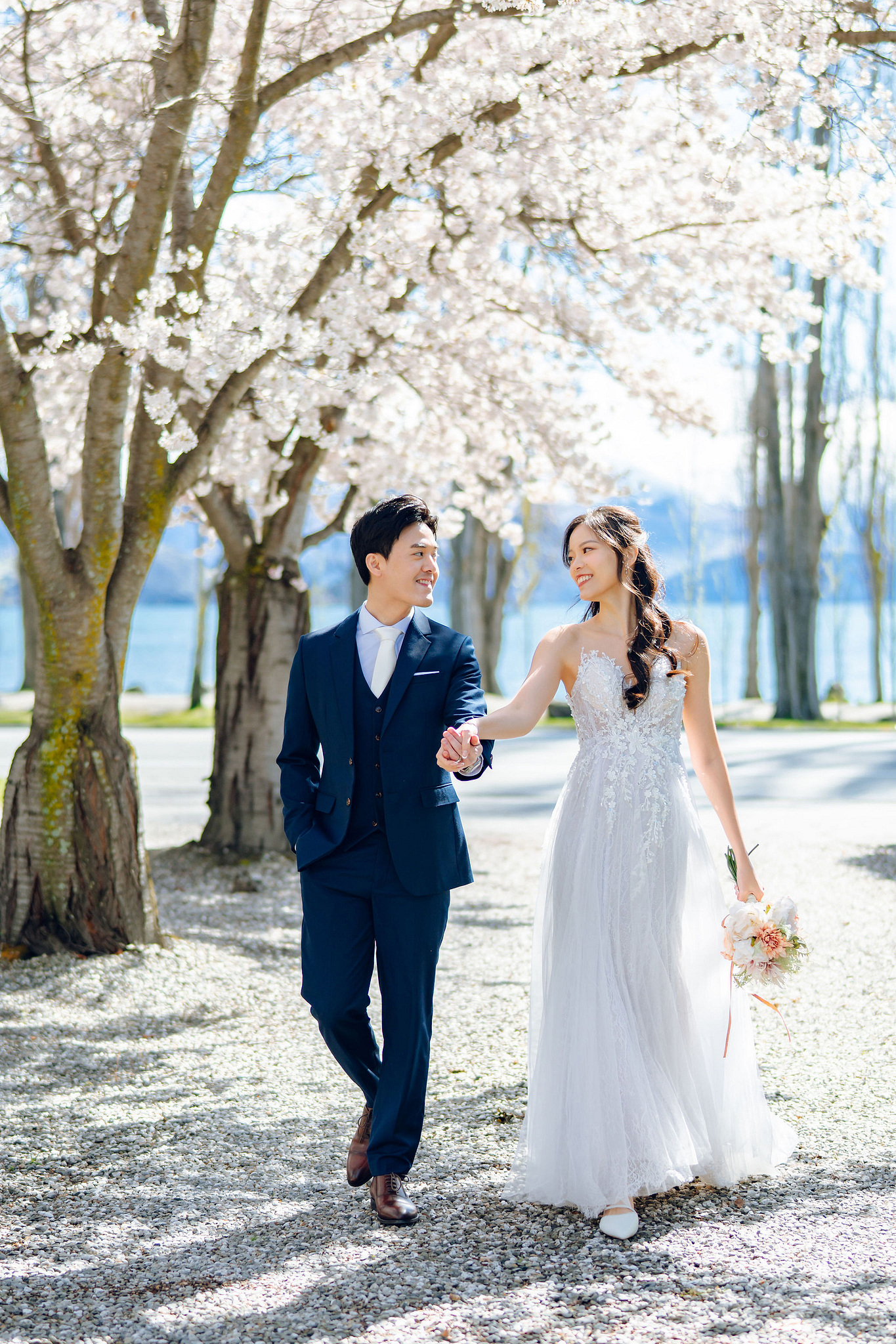New Zealand Pre-Wedding Photoshoot | Cherry Blossoms, Coromandel Peak & Lake Wakatipu at Cherry Blossoms pre-wedding photo