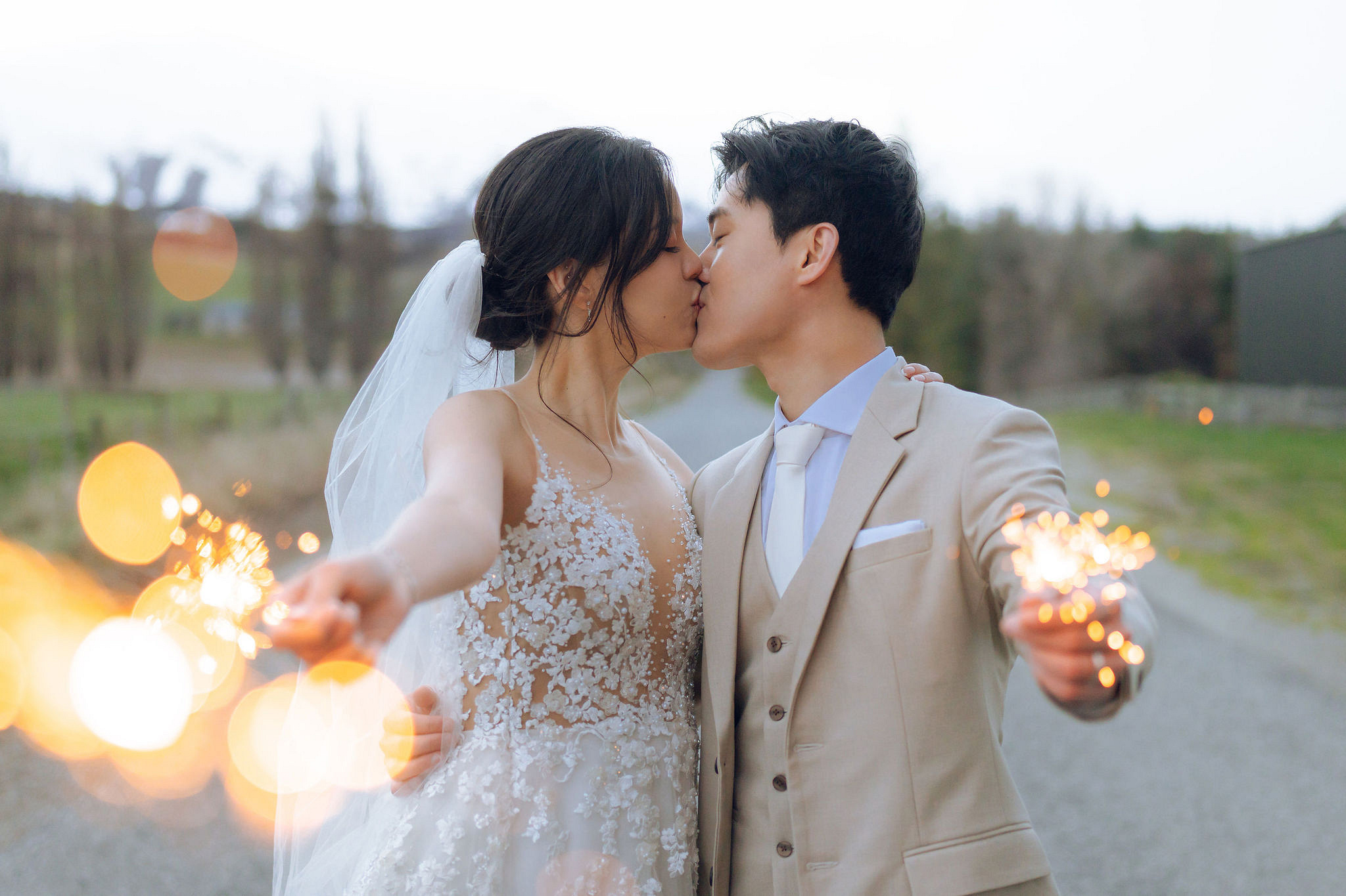 New Zealand Pre-Wedding Photoshoot | Cherry Blossoms, Coromandel Peak & Lake Wakatipu at Lake Wakatipu & Queenstown Highway pre-wedding photo