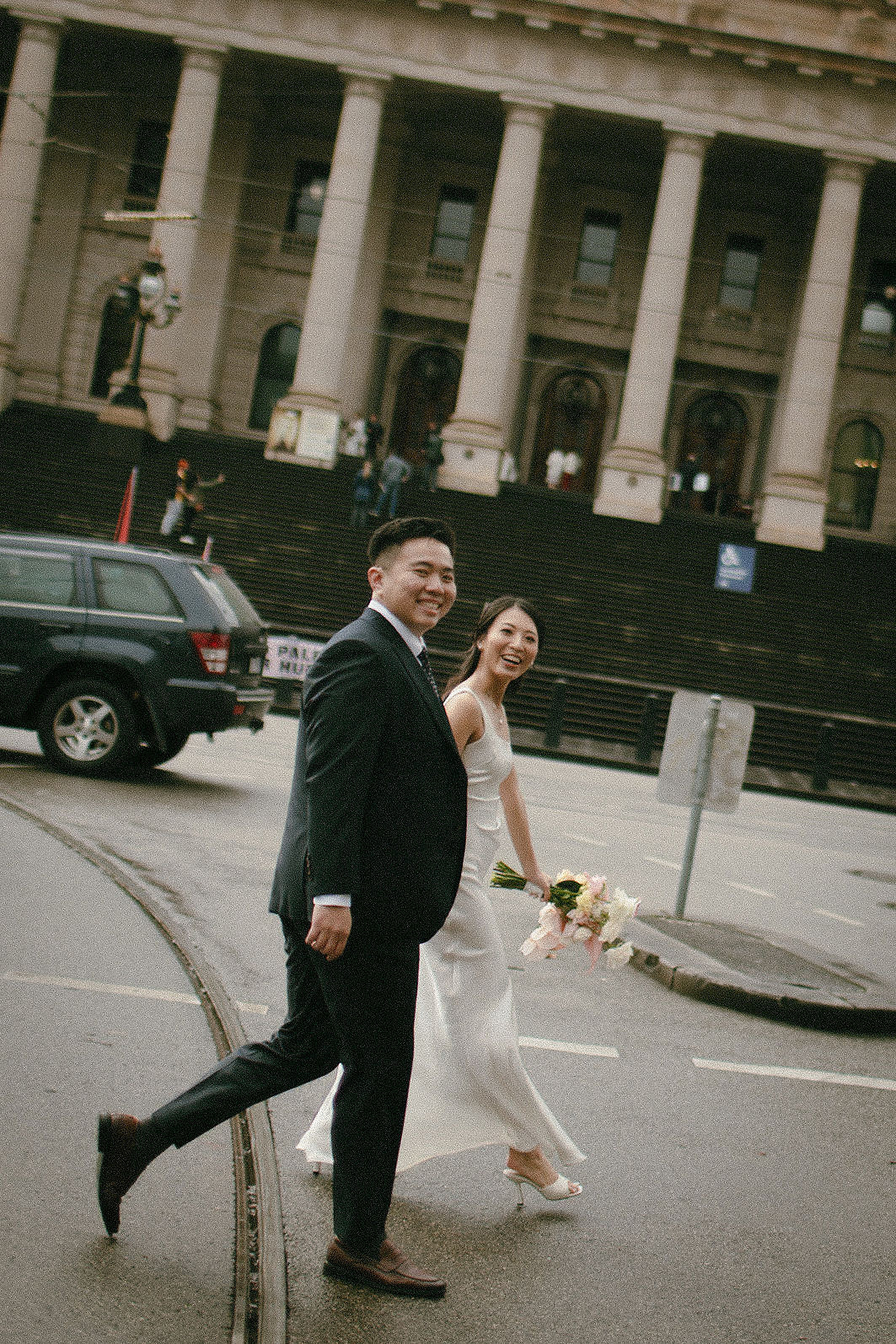 Melbourne Pre-Wedding Photoshoot | Parliament House, Fitzroy Gardens, Melbourne Streets & Half Moon Bay at Parliament House pre-wedding photo