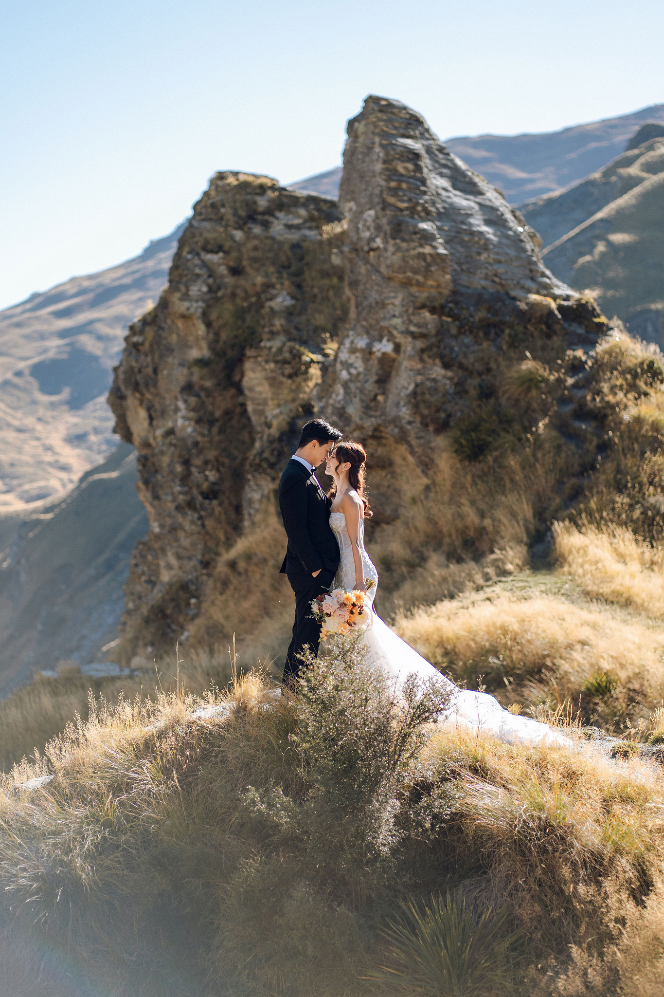 New Zealand Autumn Pre-Wedding Photoshoot Twin Peak Skippers Canyon Alpaca Farm Hilltop Cardrona Night Shoot Kombi Van at Skippers Canyon pre-wedding photo