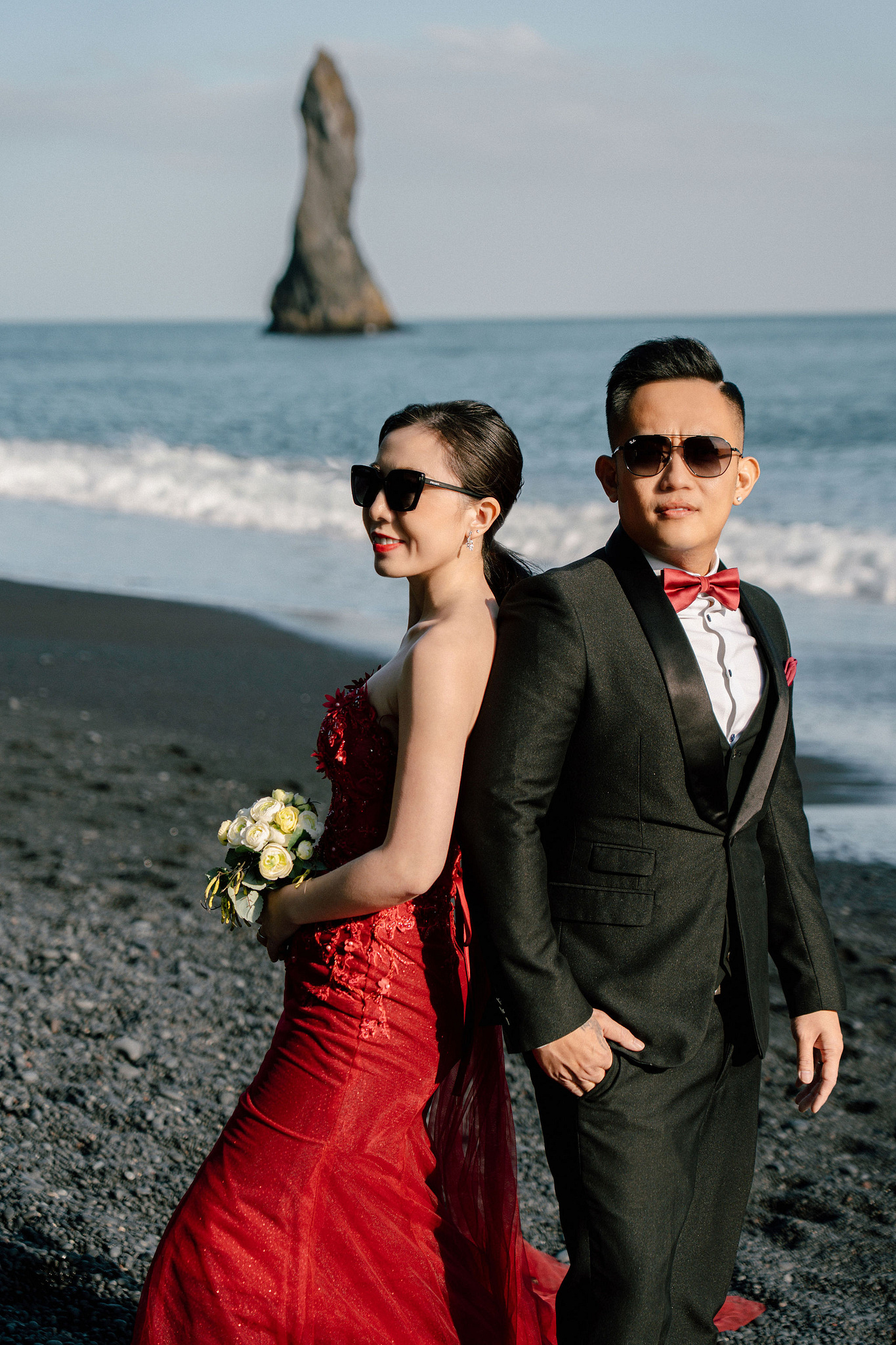 Iceland Pre-Wedding Photoshoot | Hallgrimskirkja, Skogafoss, DC Plane Wreck & Black Sand Beach at Black Sand Beach & Vik Church pre-wedding photo