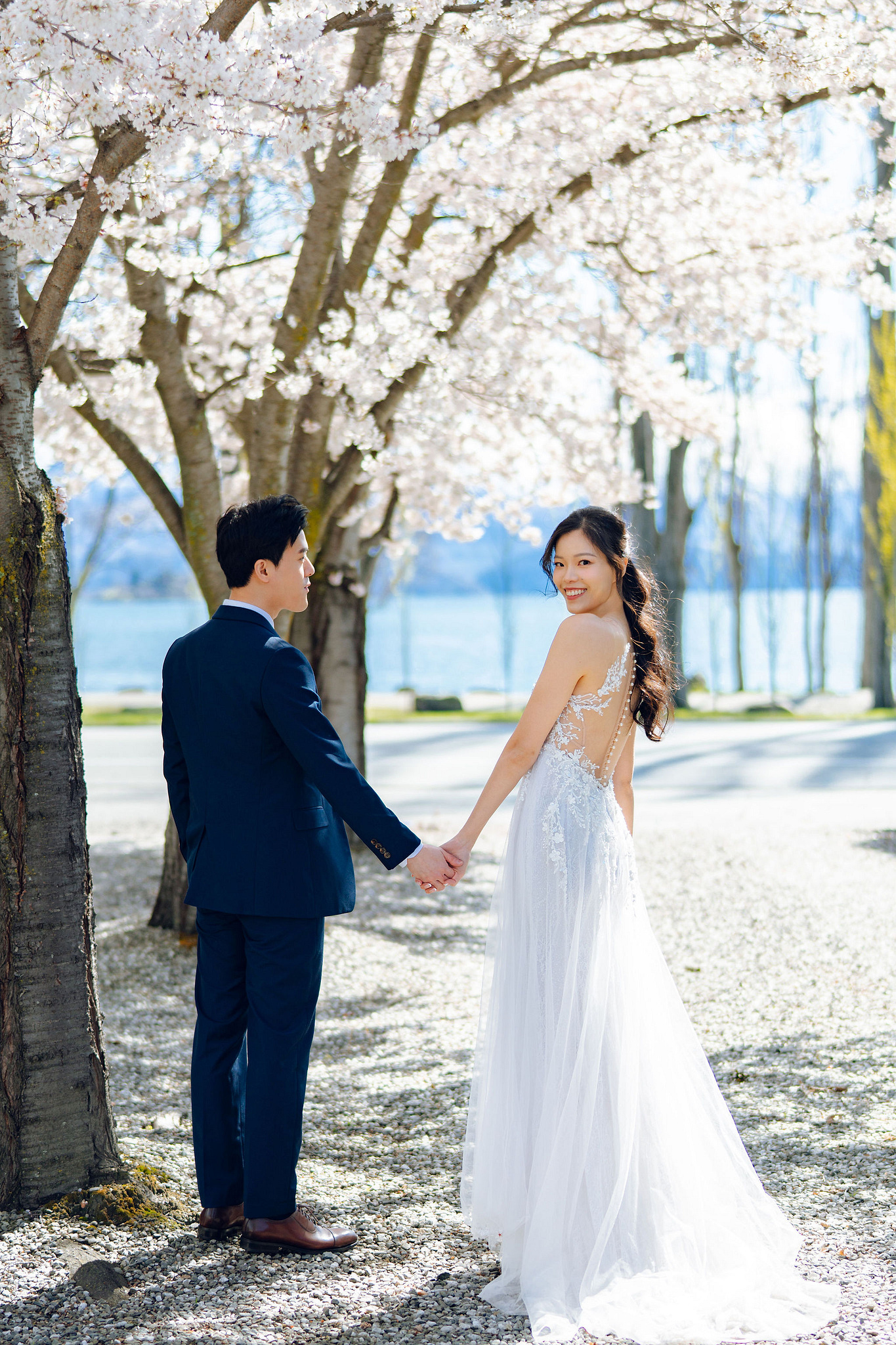 New Zealand Pre-Wedding Photoshoot | Cherry Blossoms, Coromandel Peak & Lake Wakatipu at Cherry Blossoms pre-wedding photo
