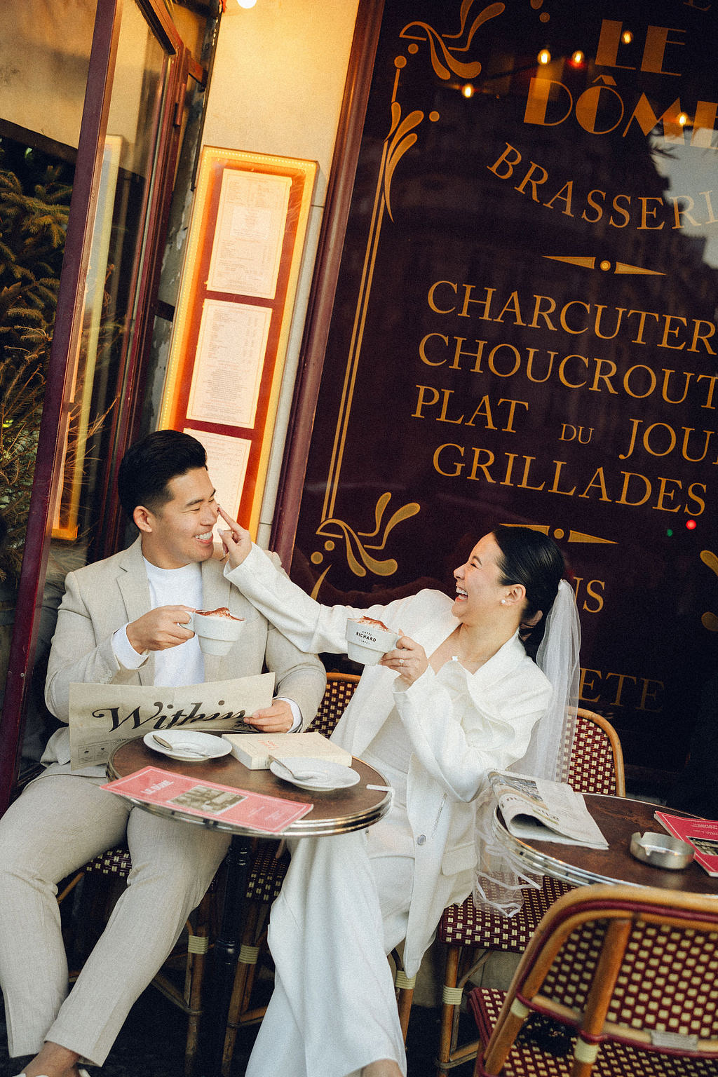 Paris Pre-Wedding Photoshoot with Eiﬀel Tower Louvre Museum Parisian Cafe Vintage Car Rooftop Night at Parisian Café pre-wedding photo