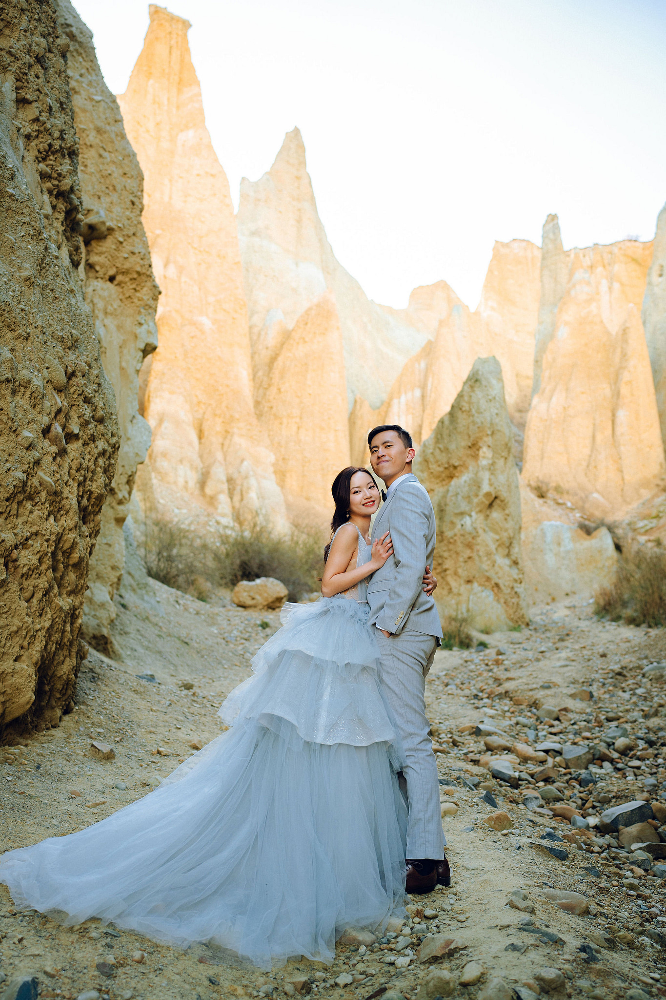 New Zealand Pre-Wedding Photoshoot with Lake Wakatipu, Skippers Canyon, Lake Tekapo, Mount Cook, and Omarama Clay Cliffs at Omarama Clay Cliffs pre-wedding photo