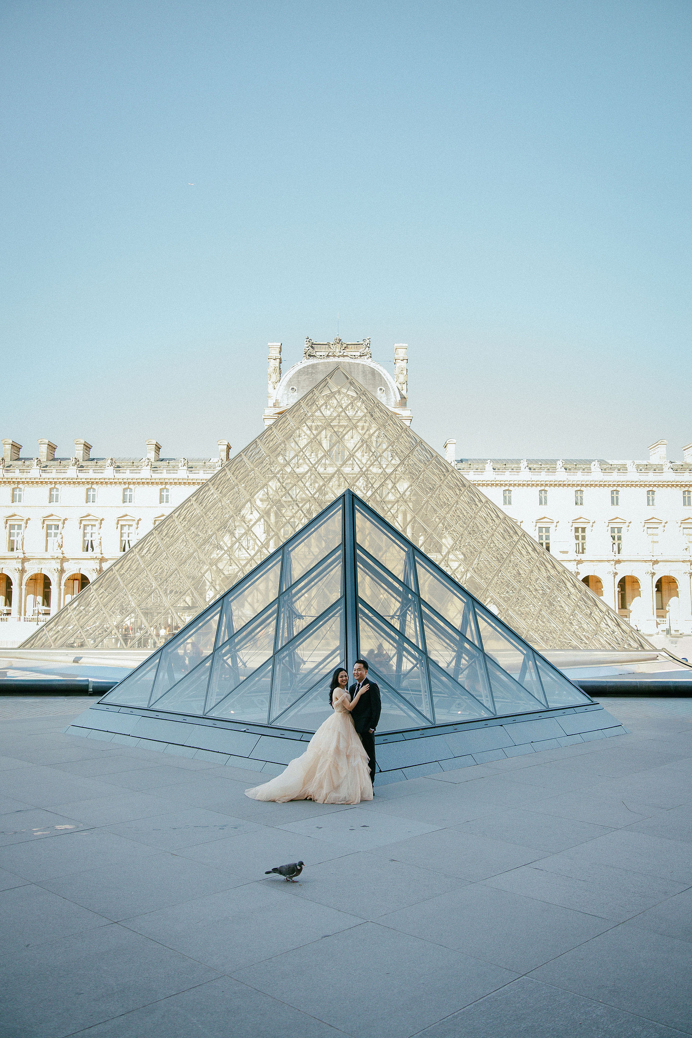 Paris Autumn Pre-Wedding Photoshoot | Avenue de Camoëns, Tuileries Garden, Louvre, Pont Alexandre III & Bir-Hakeim Bridge at Louvre pre-wedding photo