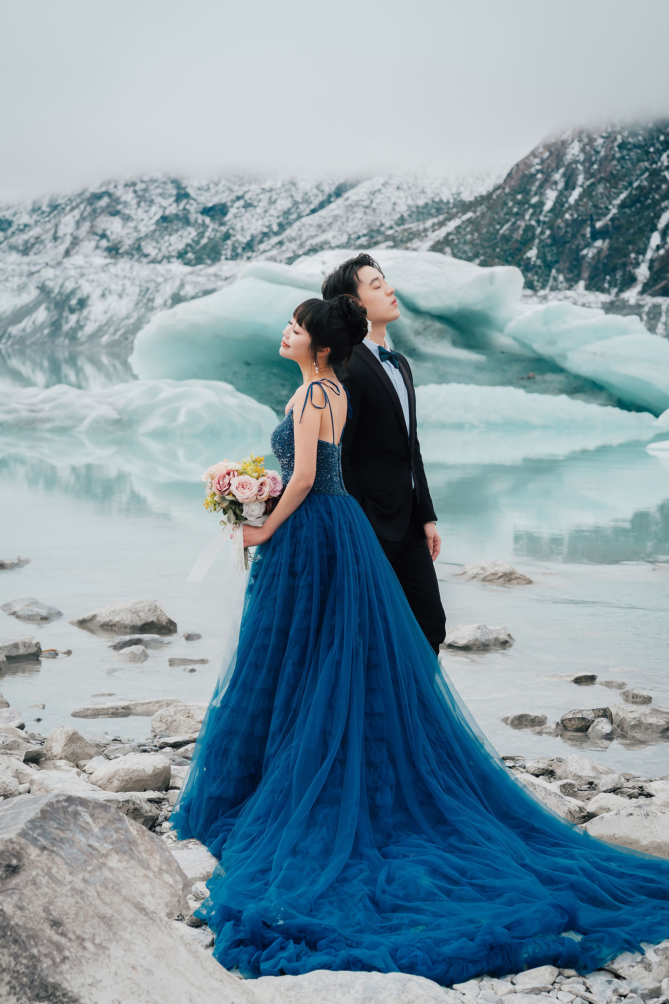 New Zealand Pre-Wedding Photoshoot | Lake Wakatipu, Fog Peak, Lake Tekapo, Glacier & Mount Cook National Park at Glacier pre-wedding photo