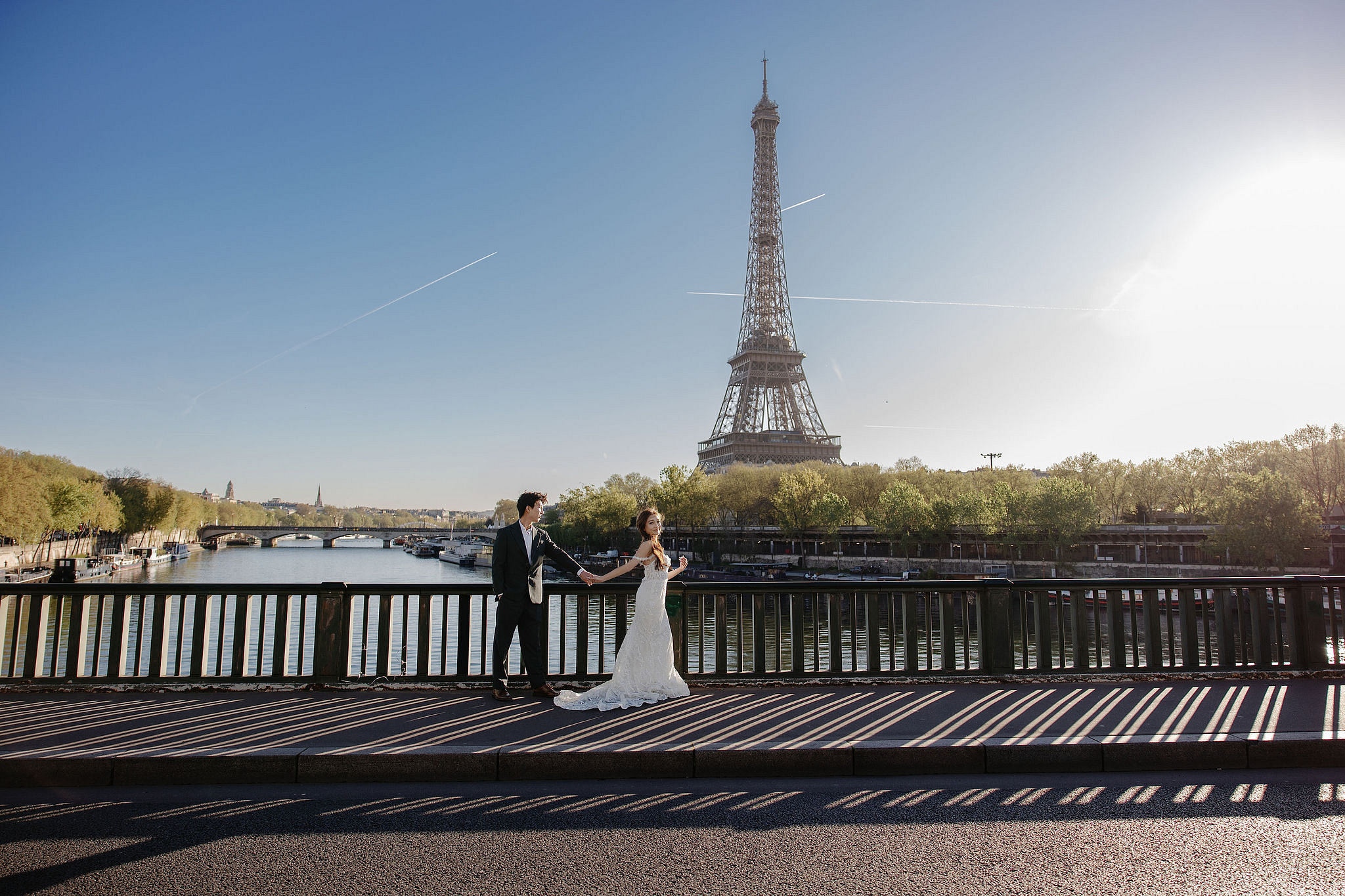 Paris Pre-Wedding Photoshoot | Place du Trocadéro, Bir-Hakeim Bridge, Sacré-Cœur Basilica, Parisian Café & Palais Royal at Bir-Hakeim Bridge pre-wedding photo