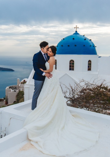 Santorini Pre-Wedding Photographer: Engagement Photoshoot In Oia During Sunset