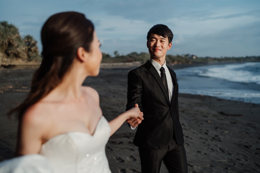 C&K: Hong Kong Couple's pre-wedding photoshoot in Bali at Lake Tamblingan, waterfall, Bali swings and beach by Hendra on OneThreeOneFour 37