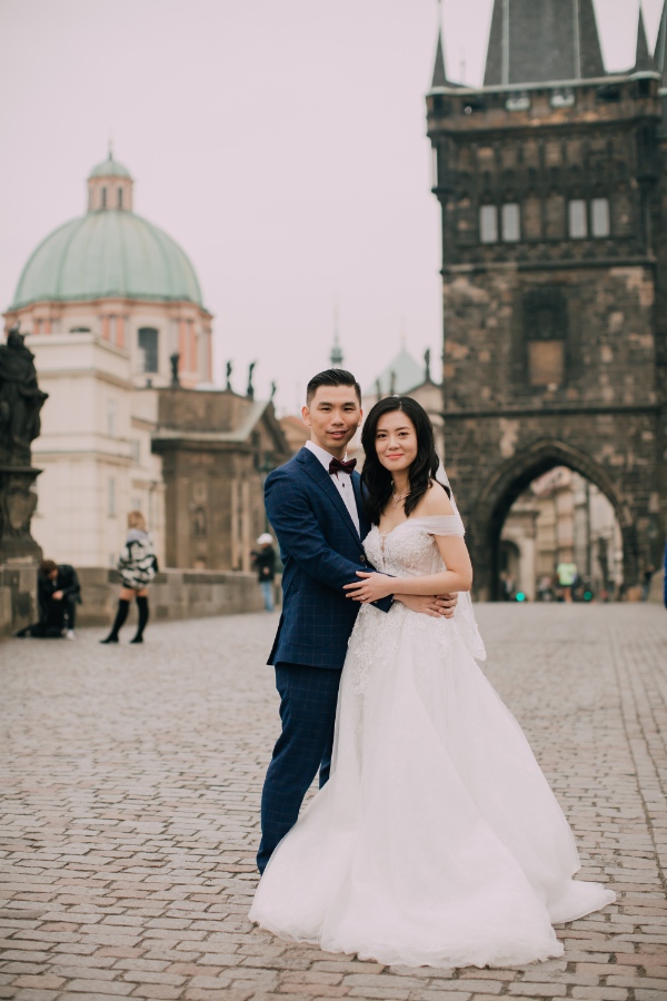 Prague Czech Republic Adventurous prewedding photography with swans, mechanical clock, at Old Town Hall by Nika on OneThreeOneFour 18