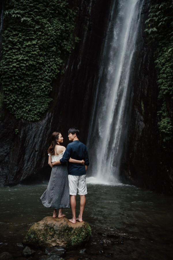 C&K: Hong Kong Couple's pre-wedding photoshoot in Bali at Lake Tamblingan, waterfall, Bali swings and beach by Hendra on OneThreeOneFour 19