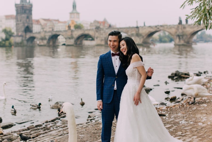 Prague Czech Republic Adventurous prewedding photography with swans, mechanical clock, at Old Town Hall by Nika on OneThreeOneFour 28