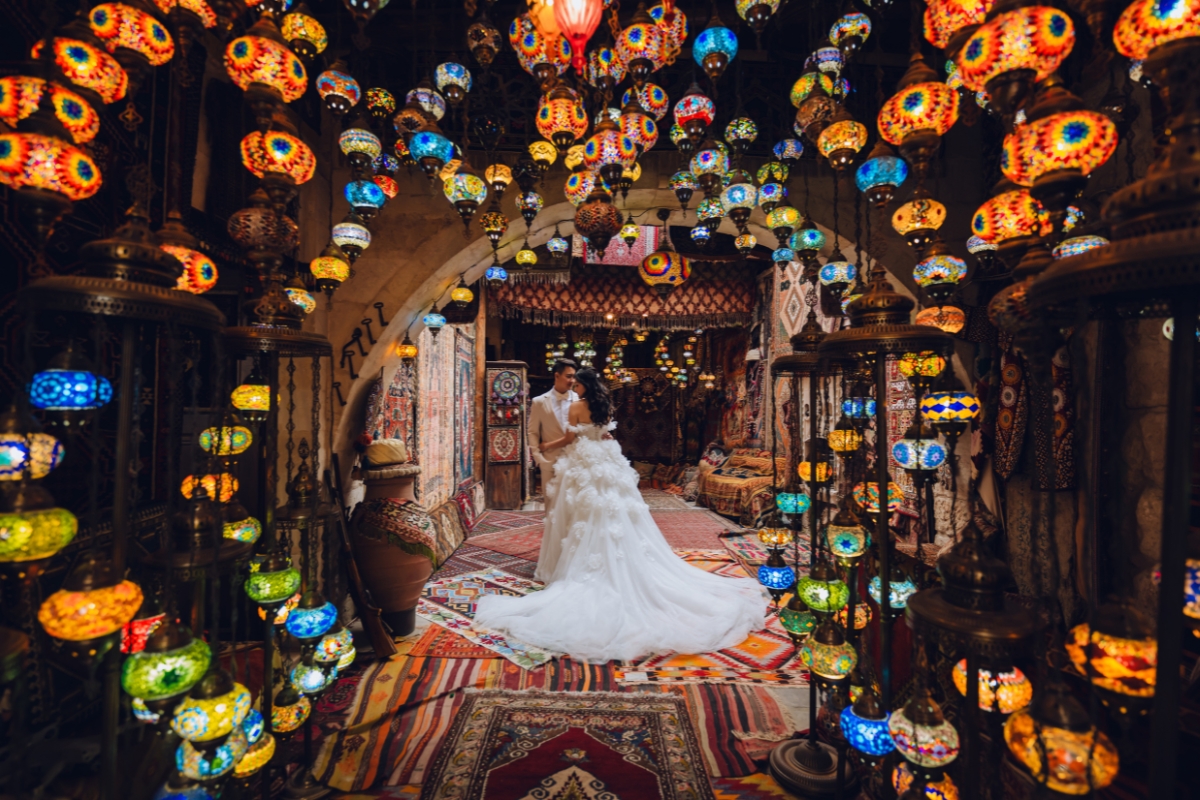 Cappadocia Pre-Wedding Photoshoot Hot Air Balloons Red Convertible Cave Hotel Roof Turkish Fairy Lamps Salt Lake by Aric on OneThreeOneFour 14