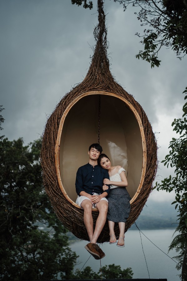 C&K: Hong Kong Couple's pre-wedding photoshoot in Bali at Lake Tamblingan, waterfall, Bali swings and beach by Hendra on OneThreeOneFour 32