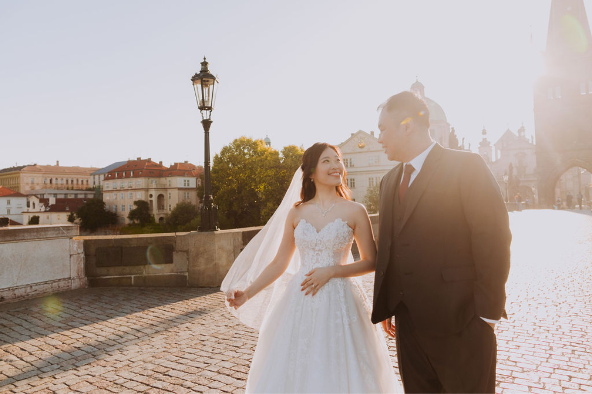 Prague prewedding photoshoot at St Vitus Cathedral, Charles Bridge, Vltava Riverside and Old Town Square Astronomical Clock by Nika on OneThreeOneFour 9
