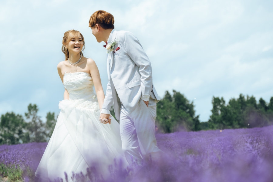 Romantic Summer Escape: Anthony & Gracie's Pre-Wedding Photoshoot in Hokkaido's Lavender Fields and Blue Ponds by Kuma on OneThreeOneFour 3