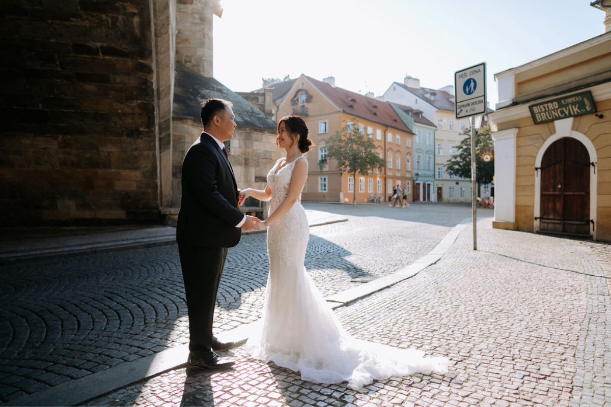 Prague prewedding photoshoot at St Vitus Cathedral, Charles Bridge, Vltava Riverside and Old Town Square Astronomical Clock by Nika on OneThreeOneFour 15