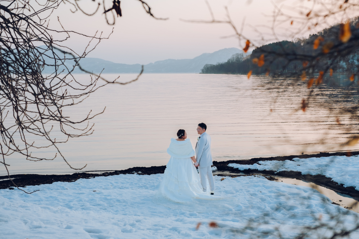 Hokkaido Prewedding Photoshoot At Lake Toya, Hilton Niseko Village And Kimono Shoot In Kaributo Shrine In Winter by Kuma on OneThreeOneFour 25