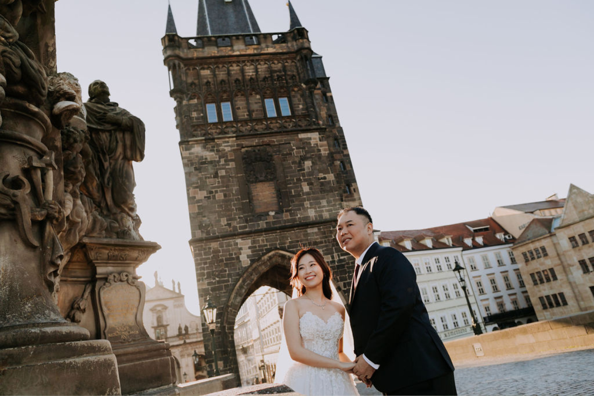 Prague prewedding photoshoot at St Vitus Cathedral, Charles Bridge, Vltava Riverside and Old Town Square Astronomical Clock by Nika on OneThreeOneFour 6