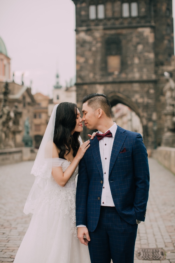 Prague Czech Republic Adventurous prewedding photography with swans, mechanical clock, at Old Town Hall by Nika on OneThreeOneFour 17
