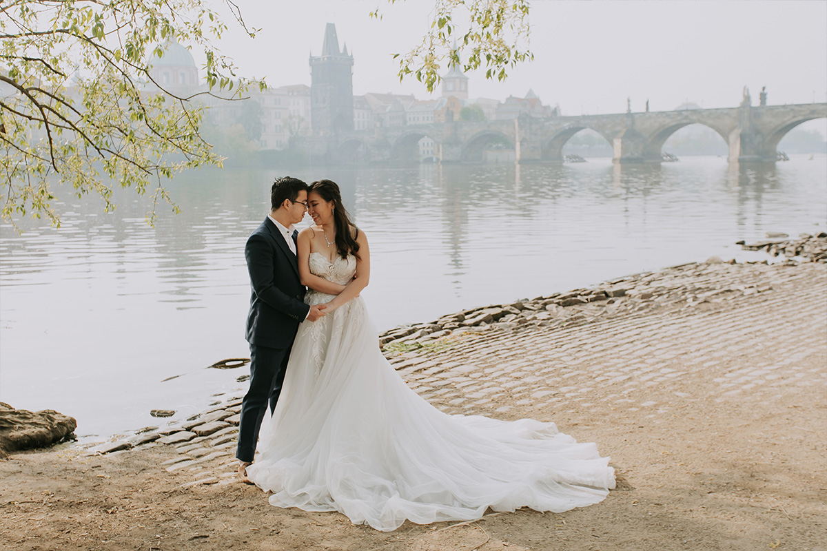 Prague Pre-Wedding Photoshoot with Astronomical Clock, Old Town Square & Charles Bridge by Nika on OneThreeOneFour 16