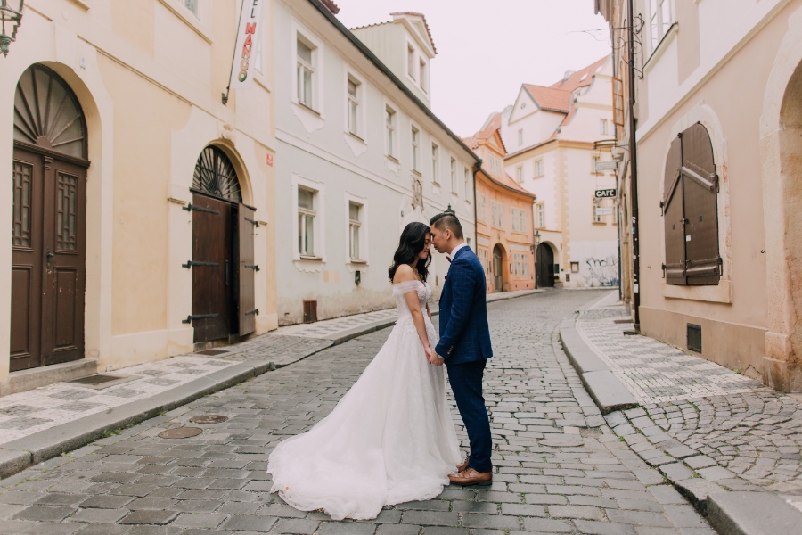 Prague Czech Republic Adventurous prewedding photography with swans, mechanical clock, at Old Town Hall by Nika on OneThreeOneFour 23