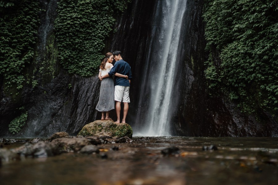 C&K: Hong Kong Couple's pre-wedding photoshoot in Bali at Lake Tamblingan, waterfall, Bali swings and beach by Hendra on OneThreeOneFour 20